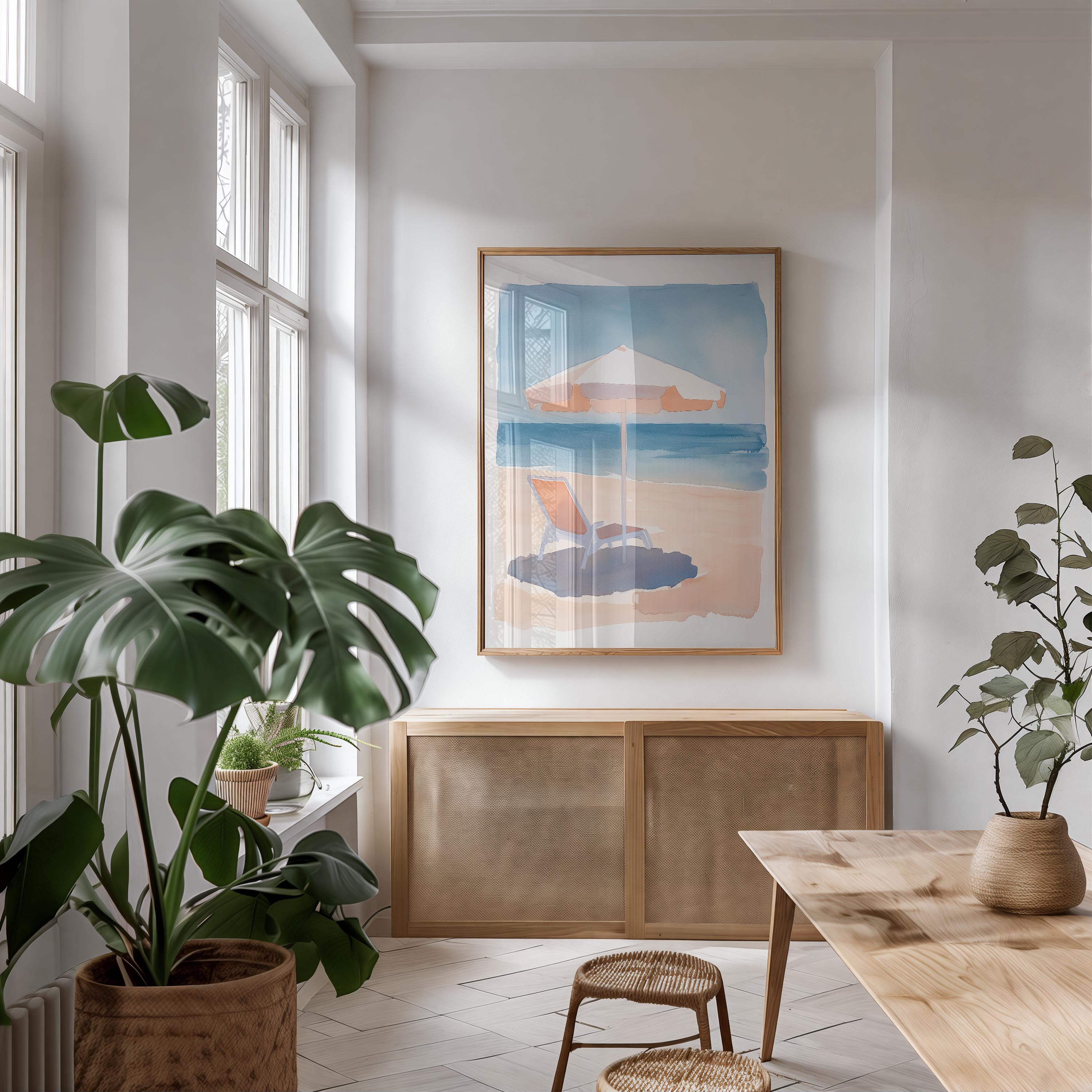 a bright and airy living room with a large window, a wooden cabinet, and a framed artwork of a beach scene hanging on the wall.