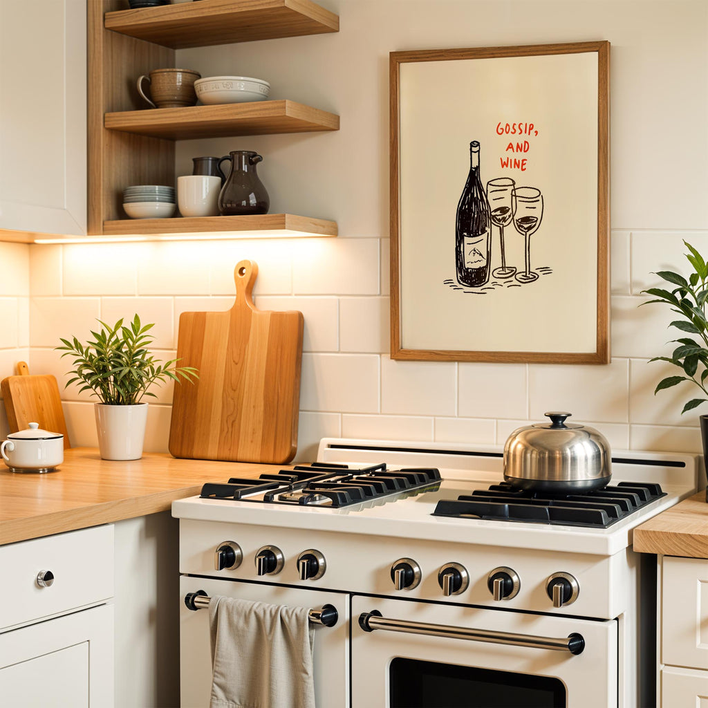 a kitchen with a white stove, wooden cutting board, and various kitchen accessories such as bowls, cups, and a potted plant. Above the stove, there is a framed illustration of wine glasses and a bottle, accompanied by the text "GOSSIP, AND WINE".