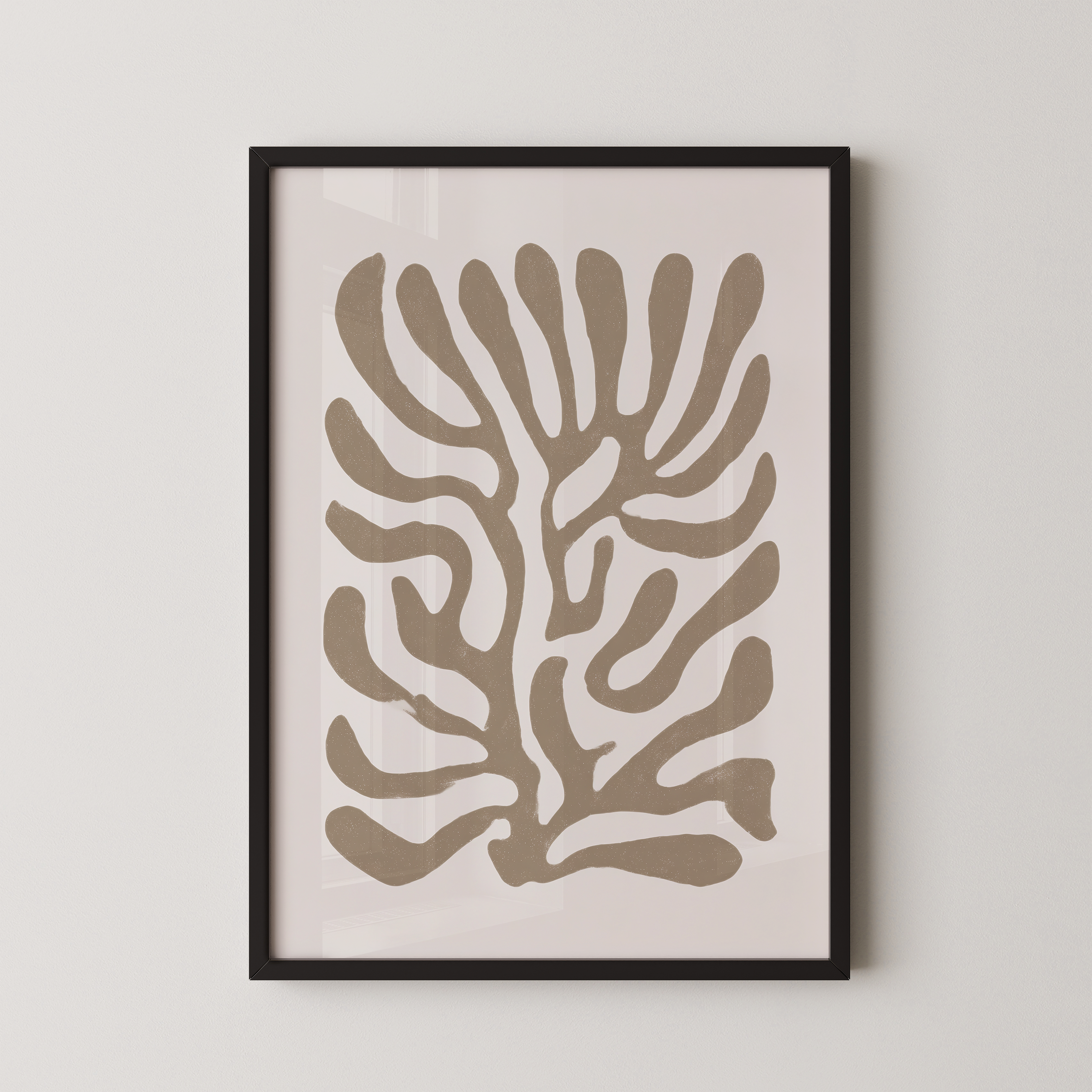 a framed abstract art print with a stylized tree-like design in shades of brown and beige.