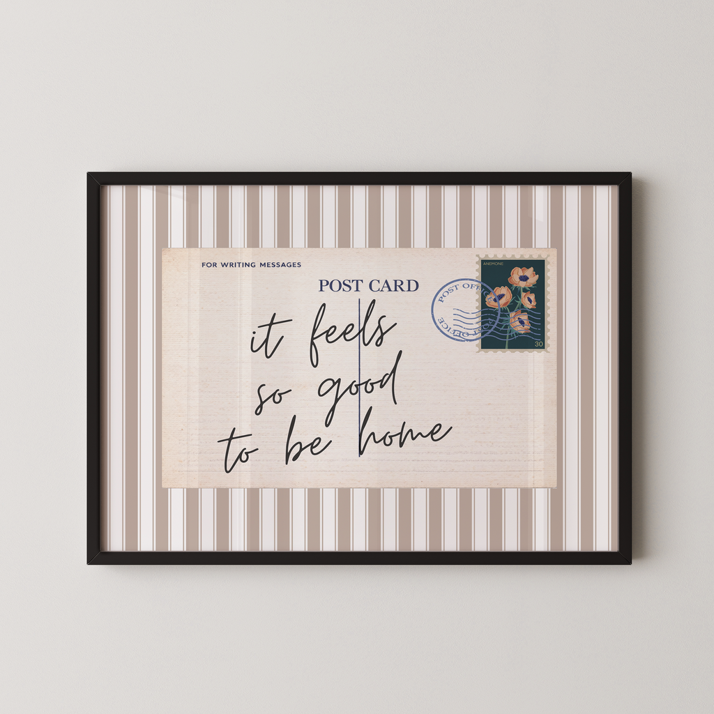 The image is a framed print with a postcard-like design, featuring a handwritten message and a postage stamp.