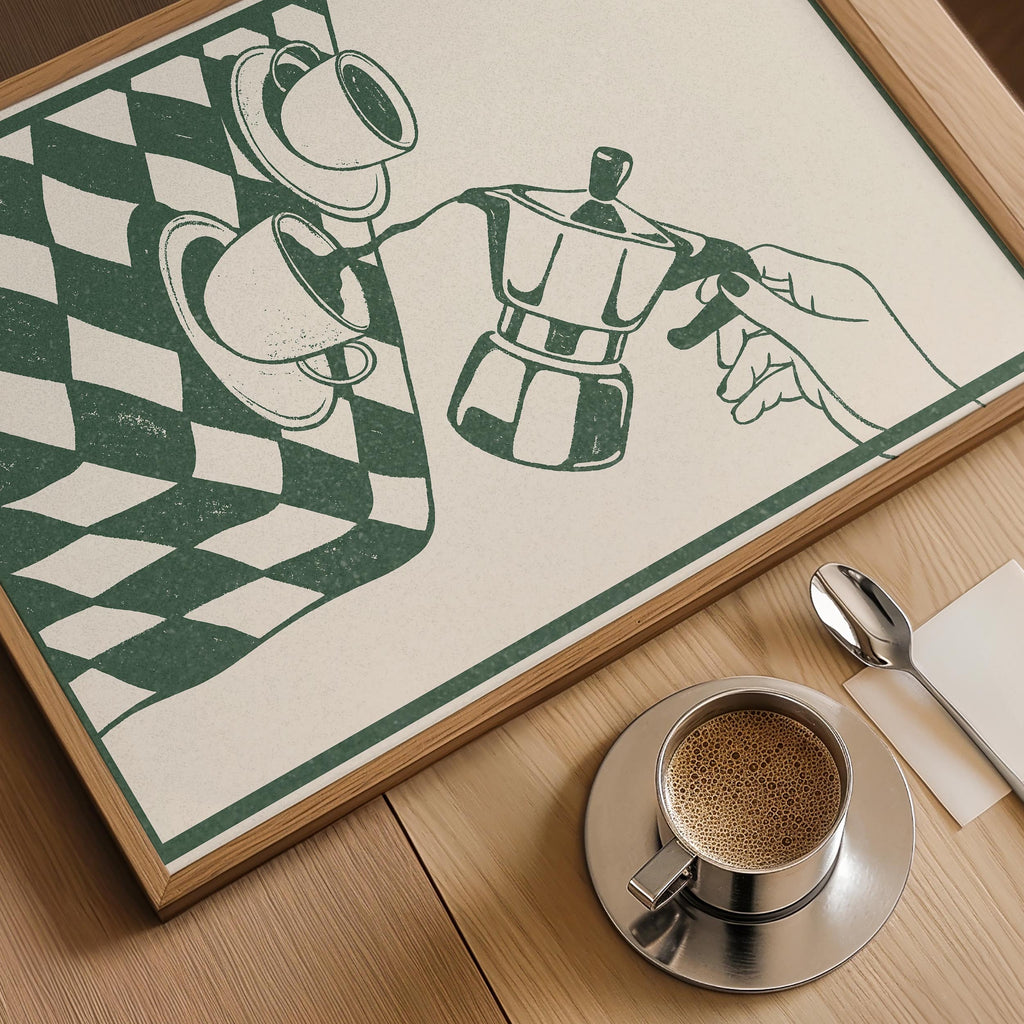 a hand holding a coffee pot, with two cups of coffee placed on a table next to it.