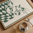 a hand holding a coffee pot, with two cups of coffee placed on a table next to it.