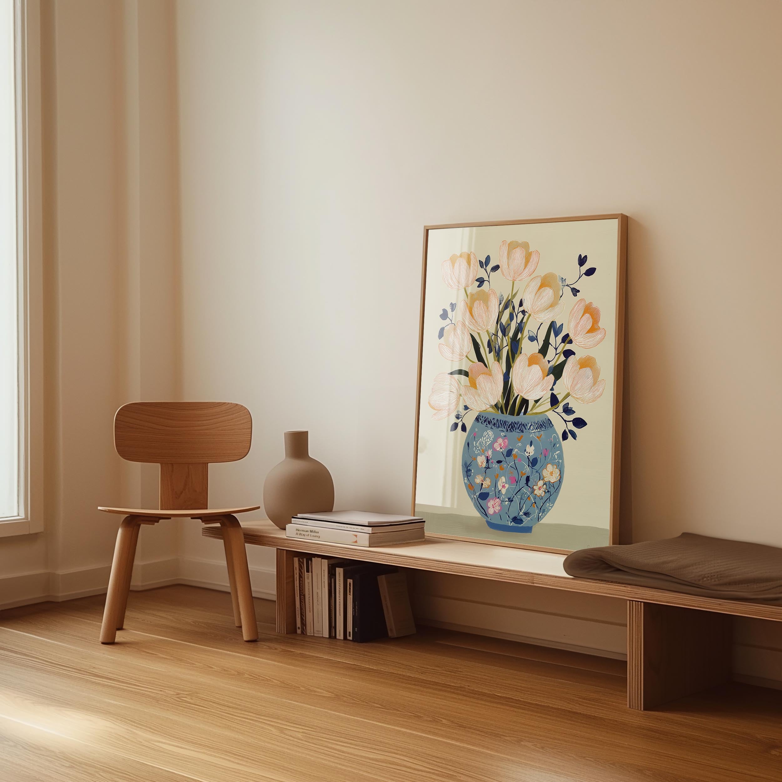 a wooden chair, a wooden bench, a vase with flowers, and a framed picture of flowers on a wall.