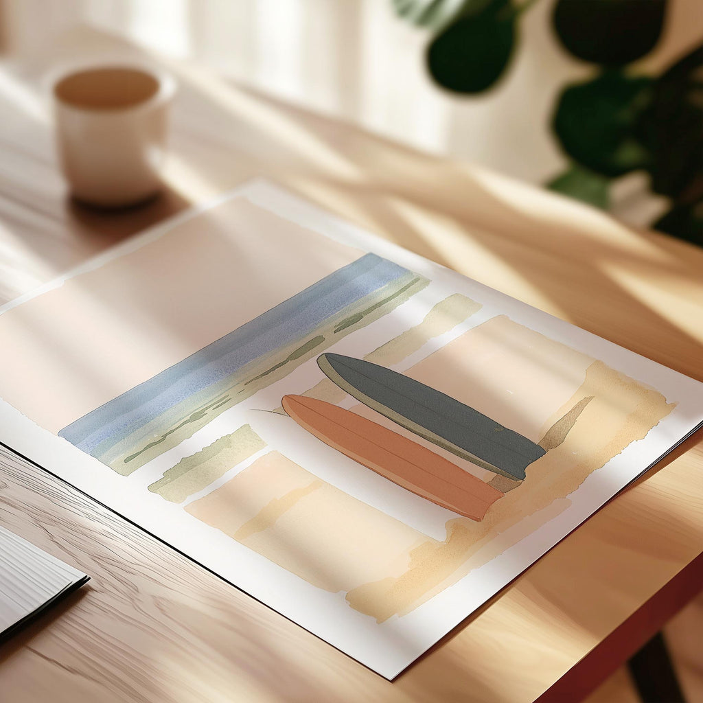 a painting of three surfboards on a white background, placed on a wooden table.