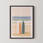 The image is a framed painting depicting two surfboards standing on a beach, with a serene ocean scene in the background.