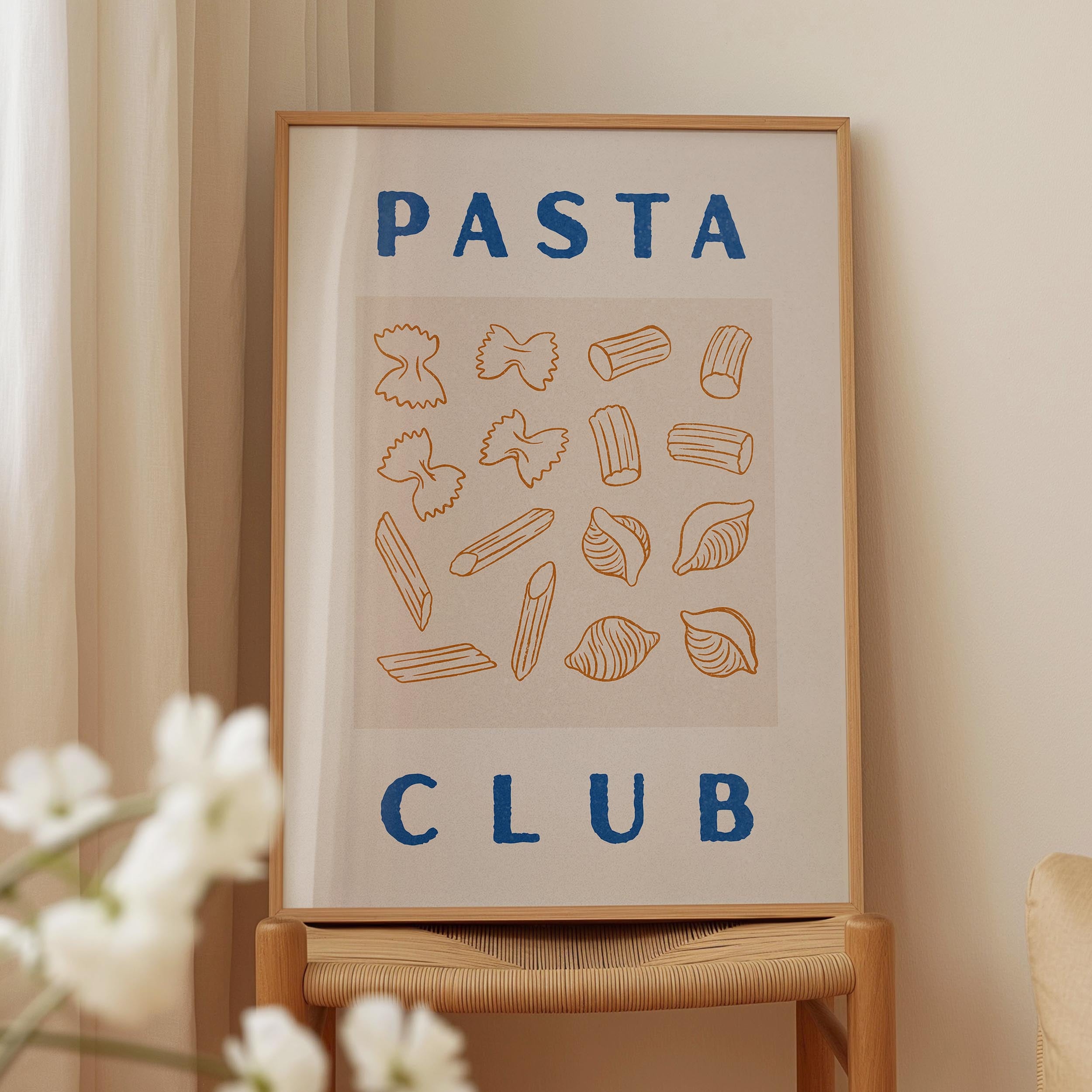 a framed poster with the text "PASTA CLUB" and various illustrations of pasta shapes.