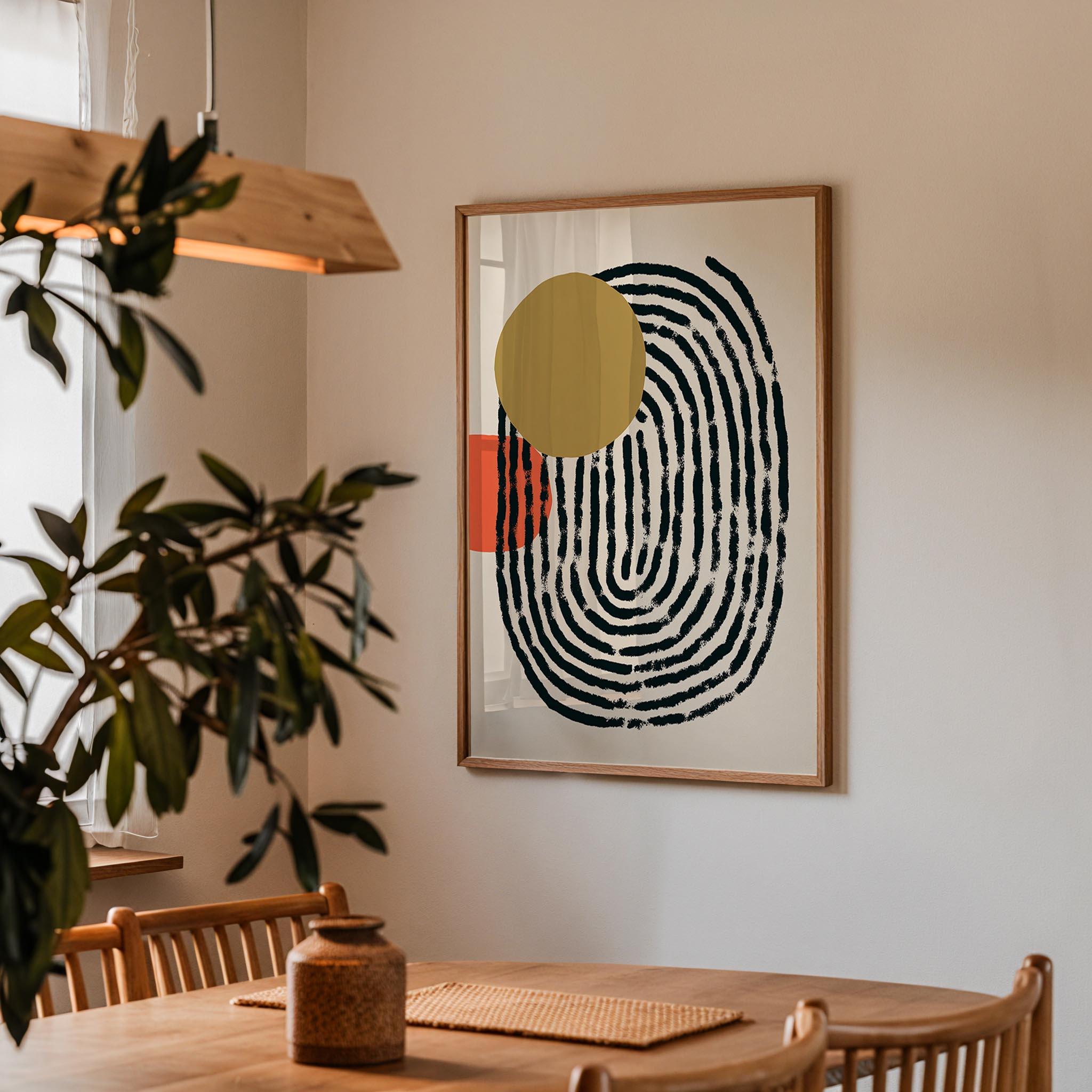 a modern dining room with a wooden table and chairs, a potted plant, and a framed abstract art piece hanging on the wall.