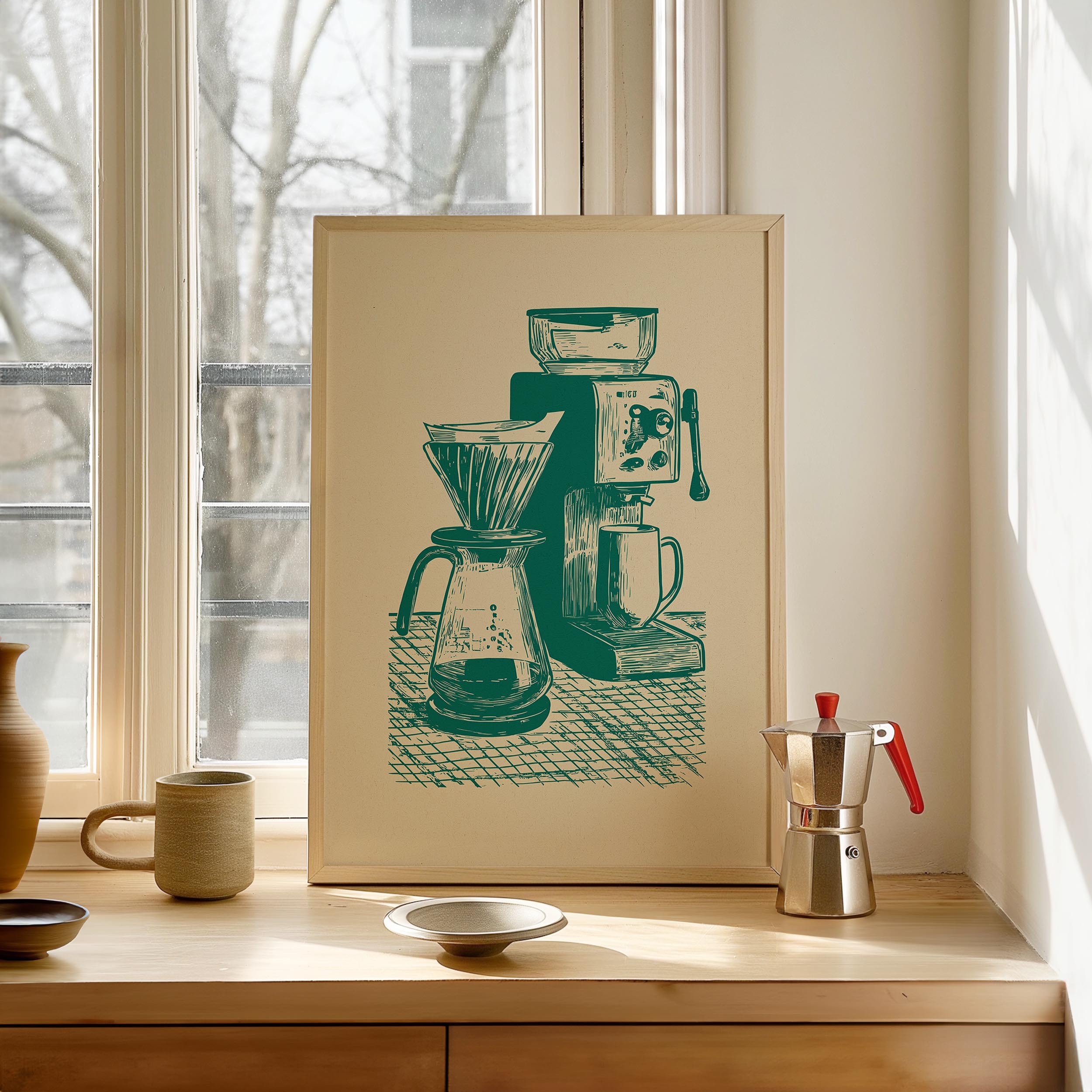 a framed illustration of a coffee maker and a coffee pot on a windowsill, with a ceramic mug and a small bowl on the windowsill as well.
