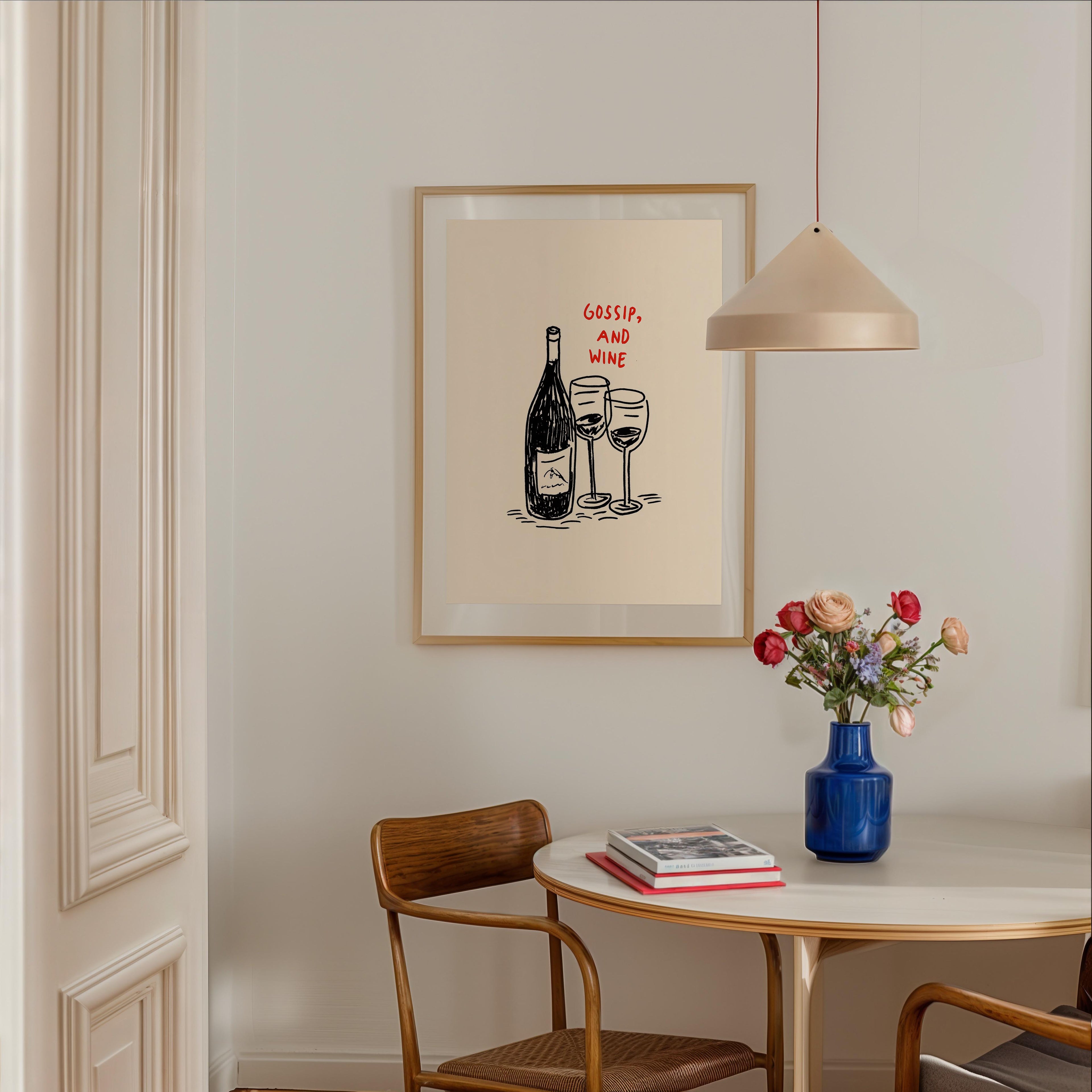 a dining area with a table, chairs, and a framed poster on the wall. The poster has a drawing of wine glasses and a bottle, along with the text "GOSSIP AND WINE".