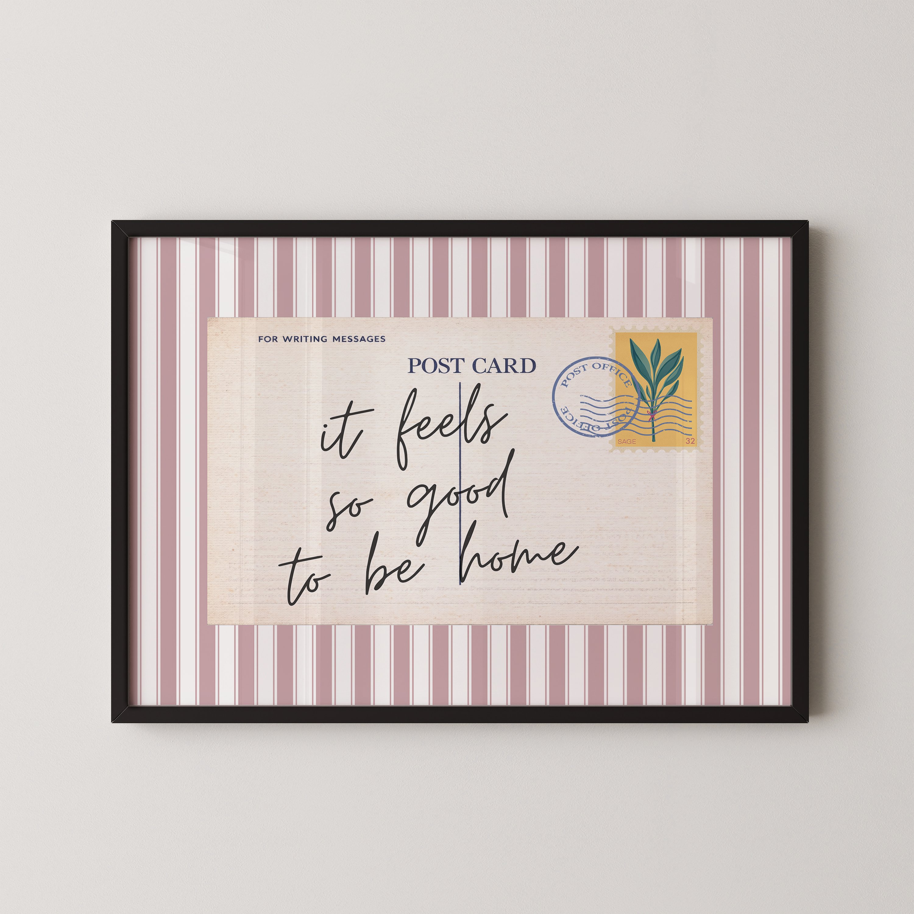 The image is a framed postcard with a handwritten message that reads "it feels so good to be home".
