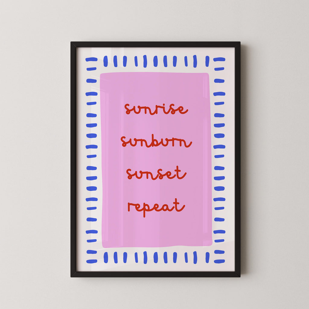 a framed poster with the text "sunrise, sunburn, sunset, repeat" written in a stylized font on a pink background.