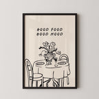 The image is a framed illustration depicting a table set for two with wine glasses, flowers, and a vase.