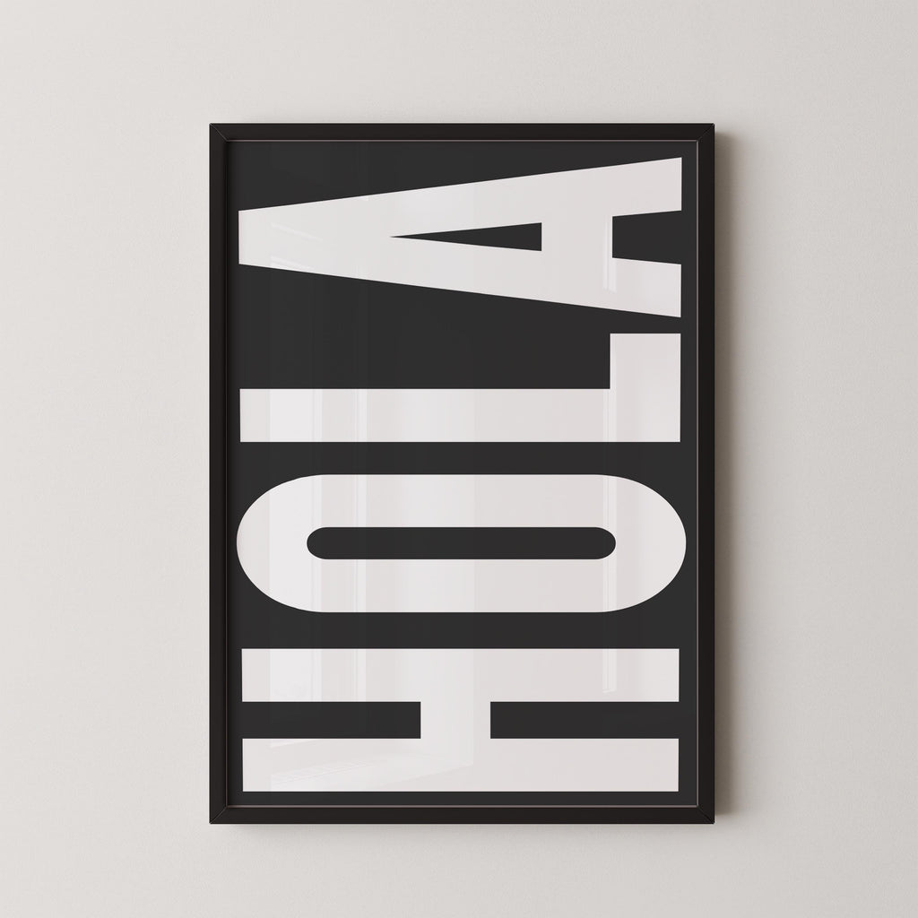 a large, bold, and white text that reads "HOLA" in a black frame.