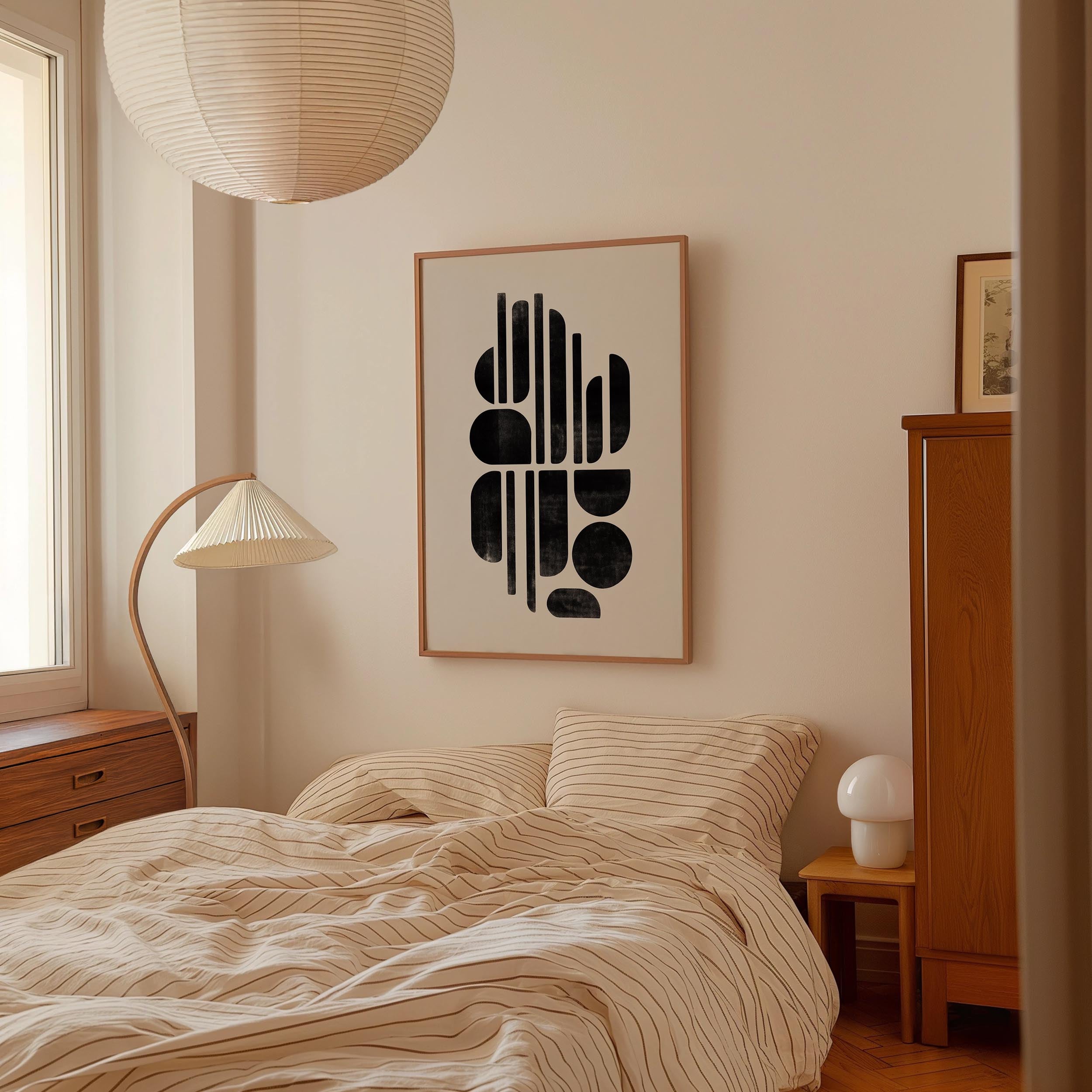 a bedroom with a bed, a lamp, and a framed abstract artwork on the wall.
