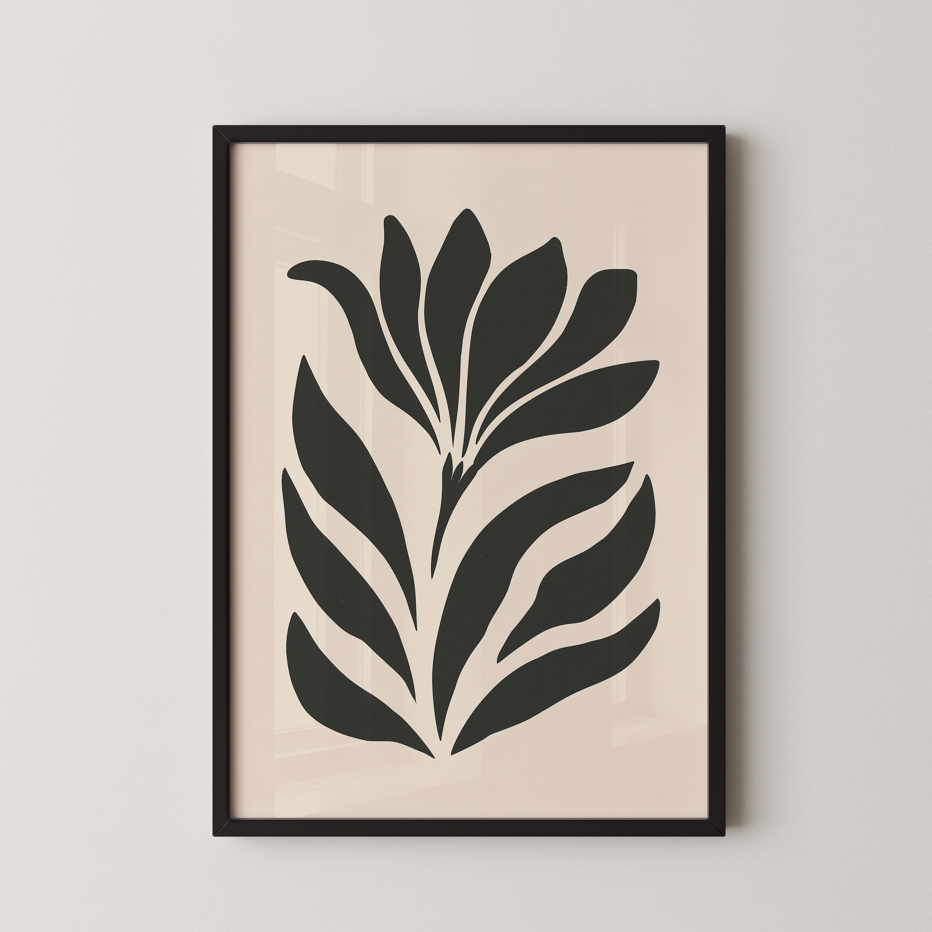 a framed artwork of a stylized plant or flower design in black and white.