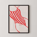 A framed illustration of a red and white striped swimsuit.