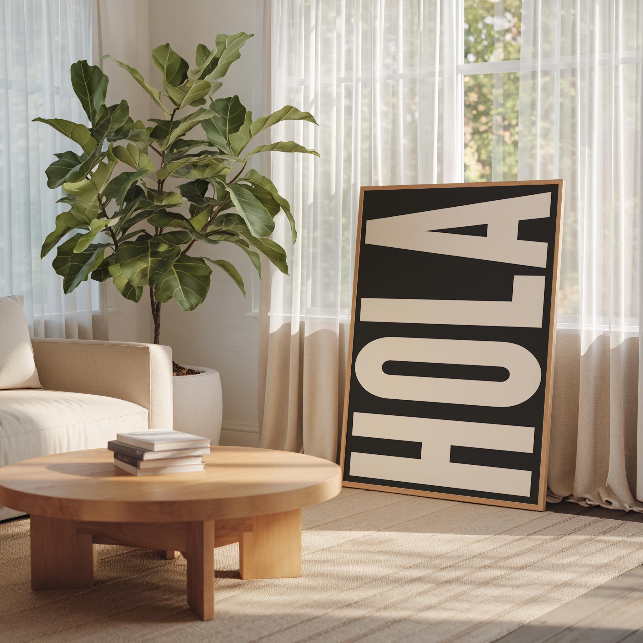 a living room with a large potted plant, a wooden coffee table, and a framed sign with the word "HOLA" on it.