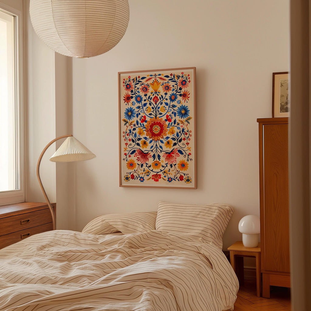 a cozy bedroom with a large bed, a wooden dresser, and a colorful floral artwork hanging on the wall.
